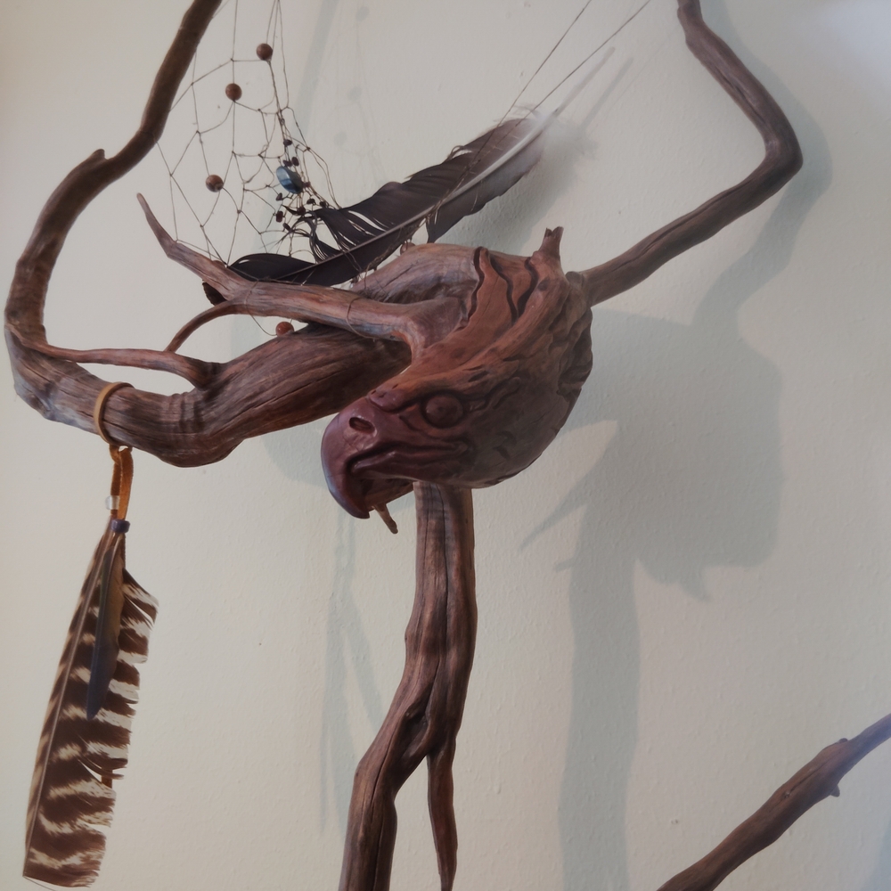 Handcrafted Wooden Eagle Sculpture with Feathers